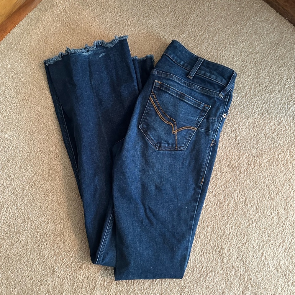 Ariat 30L mid rise with a flare and raw hem